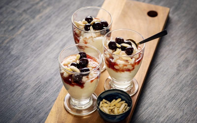 Traditional danish rice pudding or risalamande dessert served at Christmas time in Denmark and other parts of Scandinavia. It is traditionally served with a rich cherry sauce and chopped almonds. Usually there is a small silver coin hidden in the dessert that one lucky child will hopefully find.